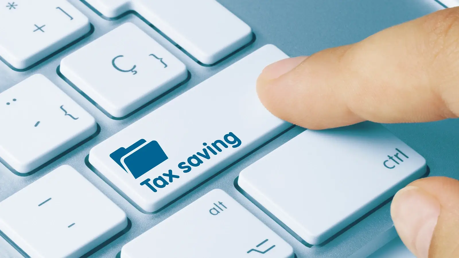 keyboard with a finger pressing a tax savings button