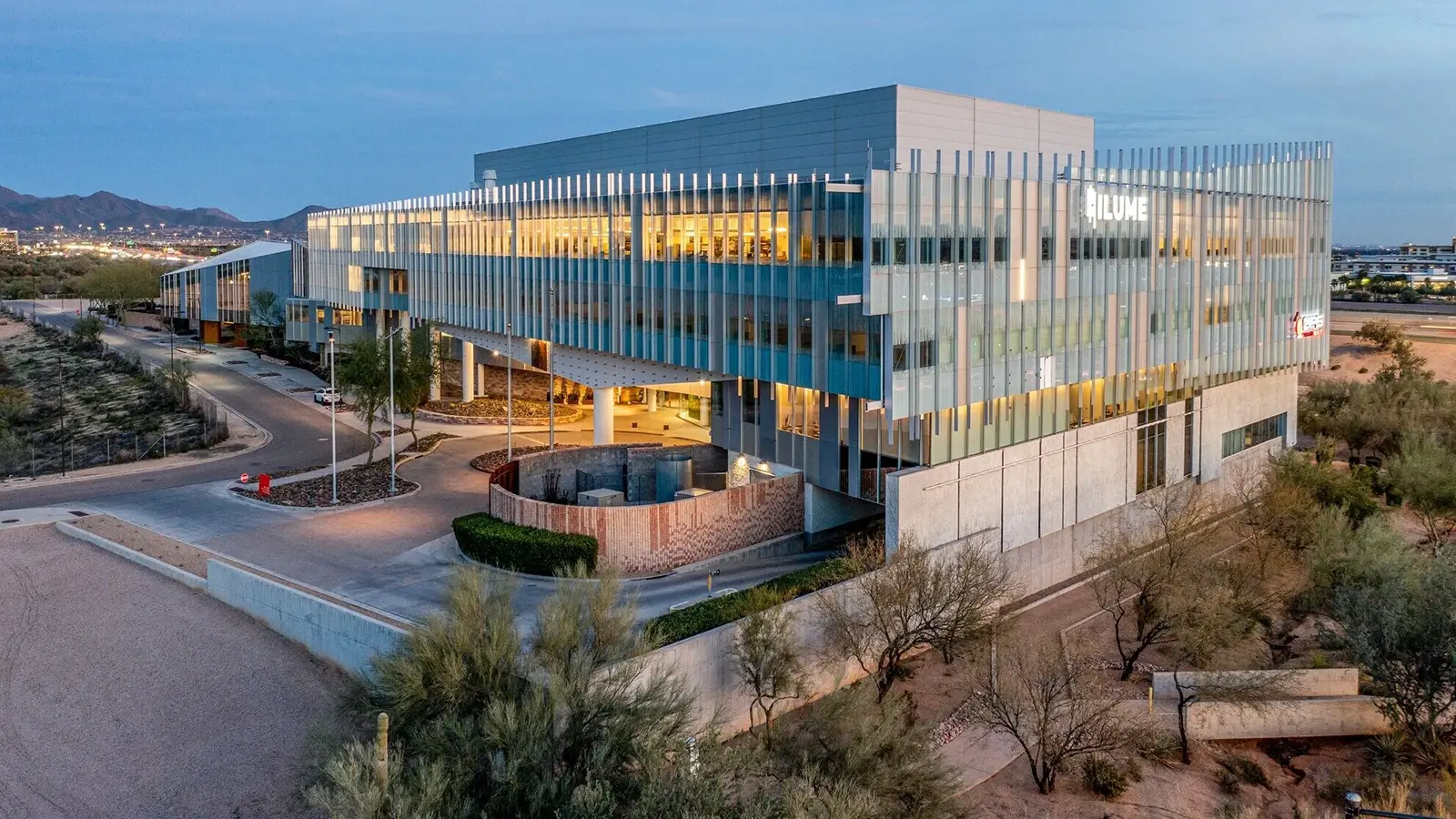 Arial view of the Ilume office building at sunset
