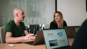 two thirdbridge workers collaborating in a meeting